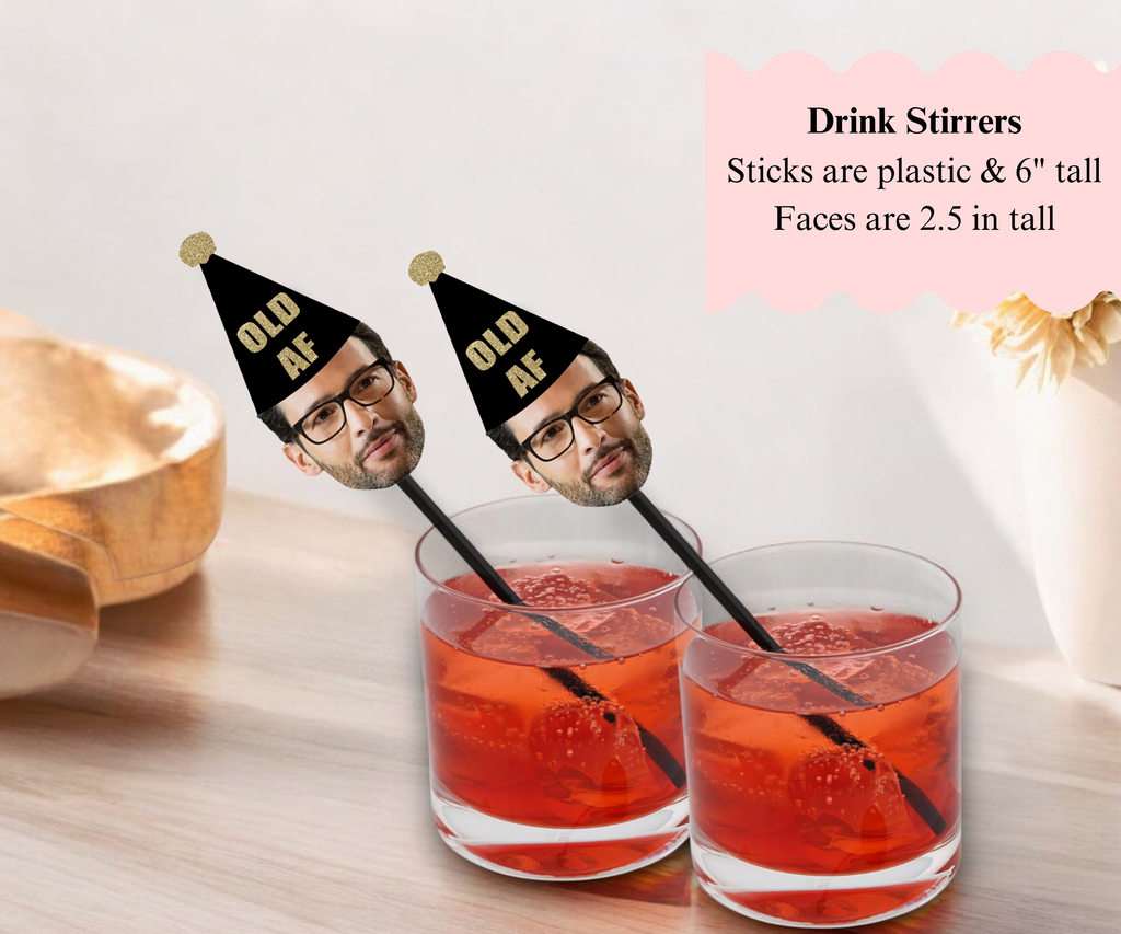 face drink stirrers wtih old af black hat 